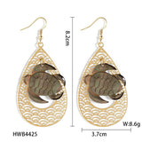 HOLLOW YELLOW SHELL LEAF CARVED EARRINGS_CWMM4366