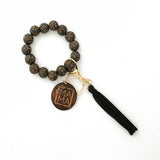 LEOPARD WOOD BEAD BRACELET WITH TASSEL KEYCHAIN_CWAB5107