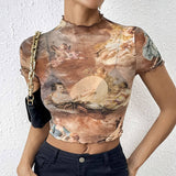 FLORAL PRINT MESH TOP WITH RUFFLE DETAILING_CWTBLS1510