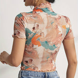 FLORAL PRINT MESH TOP WITH RUFFLE DETAILING_CWTBLS1510