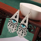 Western Devils Eye Braided Tassel Earrings