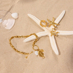 FISHBONE SHELL CHARM BRACELET 18K GOLD STEEL_CWAJE4752