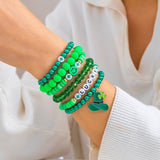 MULTI LEAF CLOVER LETTER SIMPLE BEADED BRACELET_CWAJE1475