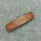 ROSE TOTEM CARVED PAINTED FAUX LEATHER HAIR CLIP_CWAHA6354