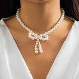 IMITATION PEARL BEADED NECKLACE WITH PEARL BOW_CWAJE1163
