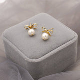 FASHIONABLE AND VERSATILE BOW PEARL EARRINGS_CWAJE1681