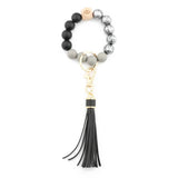 PRINTED WOOD BEAD BRACELET KEYCHAIN WITH TASSEL_CWMM7025