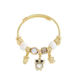 GOLD BRACELET WITH TREE HEART TAIL CHARMS_CWMM8620