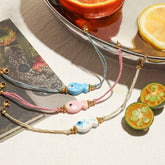 OCEAN STYLE 18K GOLD STEEL WHITE CERAMIC BRACELET_CWAJE4676