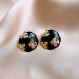 ROUND HOLLOW FLOWER FASHION EARRINGS_CWASC1329