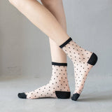 BLACK AND WHITE JACQUARD TRANSPARENT MID TUBE SOCKS_CWMS0414