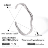 18K GOLD WAVY OPEN CUFF IN STAINLESS STEEL_CWAJE4647