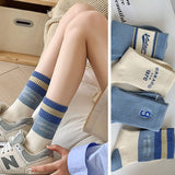 STRIPED COLOR BLOCK LETTERING SPORTS SOCKS_CWMS0964