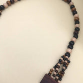 MULTI LAYERED GEOMETRIC WOODEN BEAD NECKLACE_CWMM4563