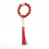 LEOPARD WOOD BEAD BRACELET KEYCHAIN WITH TASSEL_CWMM7016