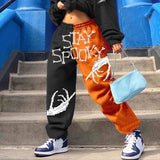 Sporty Black And Orange Harlan Straight-Leg Pants