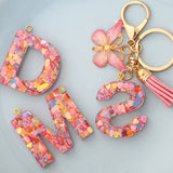 CRYSTAL LETTER SEQUIN RESIN KEYCHAIN_CWAJE0663