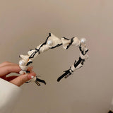 RETRO LOVE TWIST PEARL HEADBAND_CWAHA0829