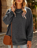 Long-sleeved ribbed sweater