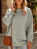 Long-sleeved ribbed sweater