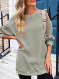 Long-sleeved ribbed sweater