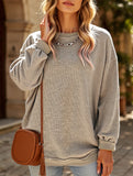 Long-sleeved ribbed sweater
