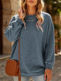 Long-sleeved ribbed sweater
