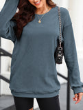 Long-sleeved ribbed sweater