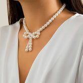IMITATION PEARL BEADED NECKLACE WITH PEARL BOW_CWAJE1163
