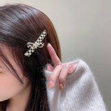 BLACK AND WHITE CHECKERBOARD PEARL BOW HAIRPIN_CWAHA4776