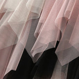 COLORBLOCK LAYERED TULLE IRREGULAR MIDI SKIRT_CWBMS0385