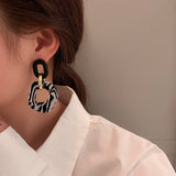STRIPED SWEET COOL STYLE CIRCLED HOLLOW EARRINGS_CWAJE2054