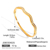 CLASSIC 18K GOLD ROUND WHITE ZIRCON OPEN BANGLE_CWAJE4808