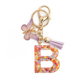 PINK SNOWFLAKE LETTER BUTTERFLY KEYCHAIN_CWMM6865