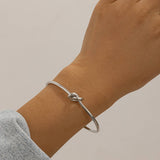 SIMPLE DOUBLE LAYER HOLLOW KNOTTED OPEN BRACELET_CWMM3101