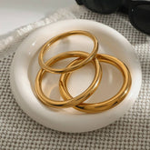 ELEGANT GOLD TONE ROUND BANGLE TITANIUM STEEL_CWAJE4704