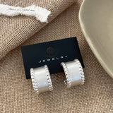 TEMPERAMENTAL AND FASHIONABLE SEMI ARC EARRINGS_CWAJE3124