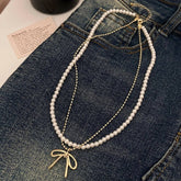 FASHIONABLE TASSEL BOW PEARL DOUBLE LAYER NECKLACE_CWAJE3056