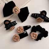 BLACK VELVET APRICOT CAMELLIA HAIR ACCESSORY_CWAHA4691