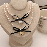 BOWKNOT DOUBLE PEARL HEART PENDANT NECKLACE_CWAJE3080