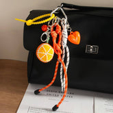 HANDMADE ORANGE KEYCHAIN WITH HEART BELL_CWMM7635