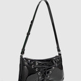GLOSSY BOW STUDDED DRAWSTRING SHOULDER BAG_CWAB5704