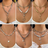 BEADED NECKLACE WITH STAR SHAPED PENDANT TASSELS_CWAJE1158