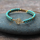 GOLD TONE REIKI SYMBOL YOGA BRAIDED BRACELET_CWAJE3922