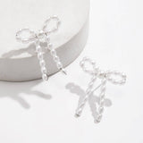 BOW FRENCH TASSEL PEARL EARRINGS_CWAJE1156