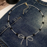 ELEGANT AND FRESH BOW BEADED PEARL NECKLACE_CWAJE3057