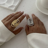IRREGULAR GEOMETRIC ELLIPSE ALLOY WINDING RING_CWMM3229