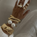 FASHIONABLE METALLIC SMOOTH SPRING BRACELET_CWMM3116