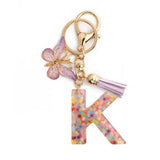 PINK SNOWFLAKE LETTER BUTTERFLY KEYCHAIN_CWMM6865