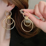 MINIMALIST GLOSSY CIRCULAR COMMUTING EARRINGS_CWAJE2049